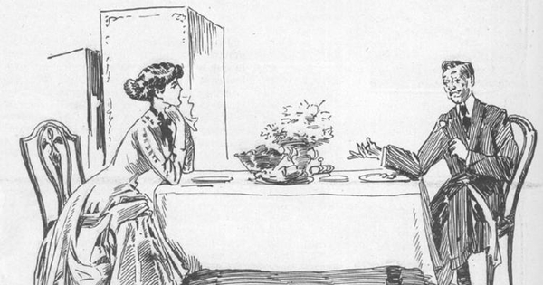 Marido y mujer sentados a la mesa