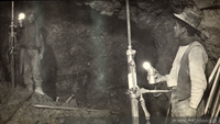 Dos mineros trabajan al interior de la mina con sus jacklegs o perforadoras, ca. 1915